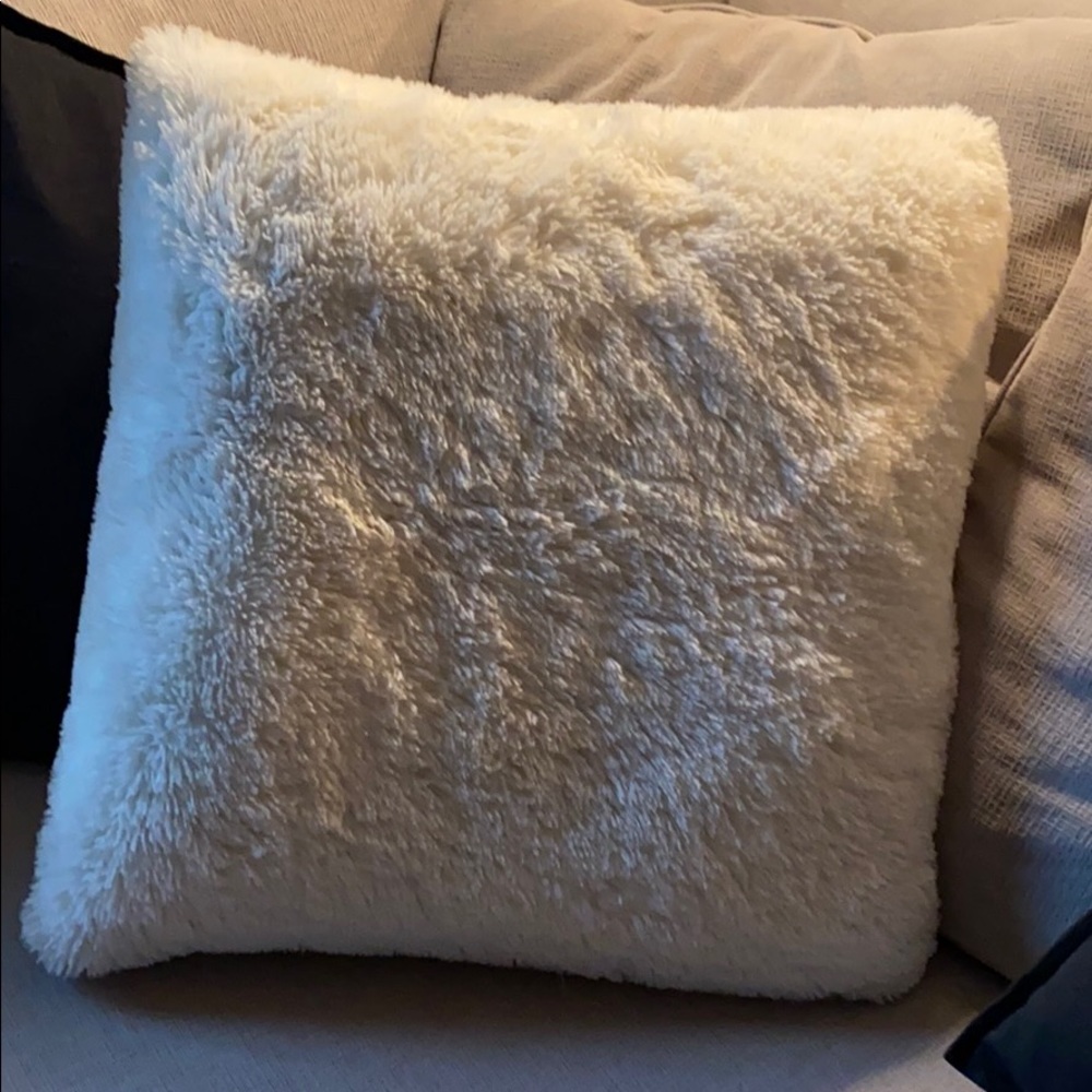 Ivory fuzzy throw pillow